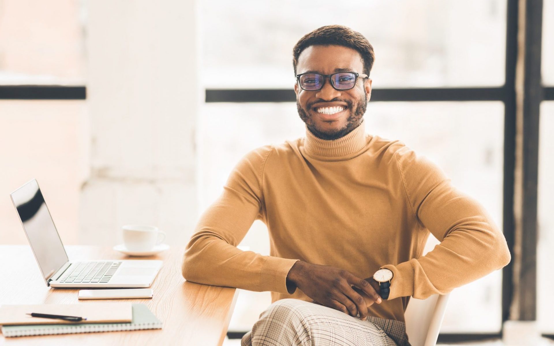 portrait-of-happy-black-manager-looking-at-camera-EAPQ4YL-scaled-e1589488586209.jpg