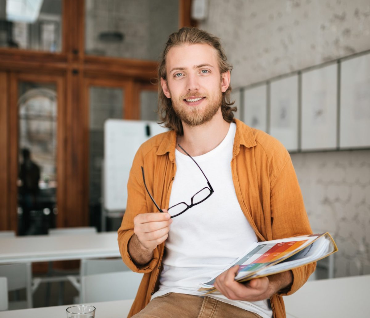 smiling-boy-with-blond-hair-and-beard-joyfully-loo-5USXMTR-scaled.jpg