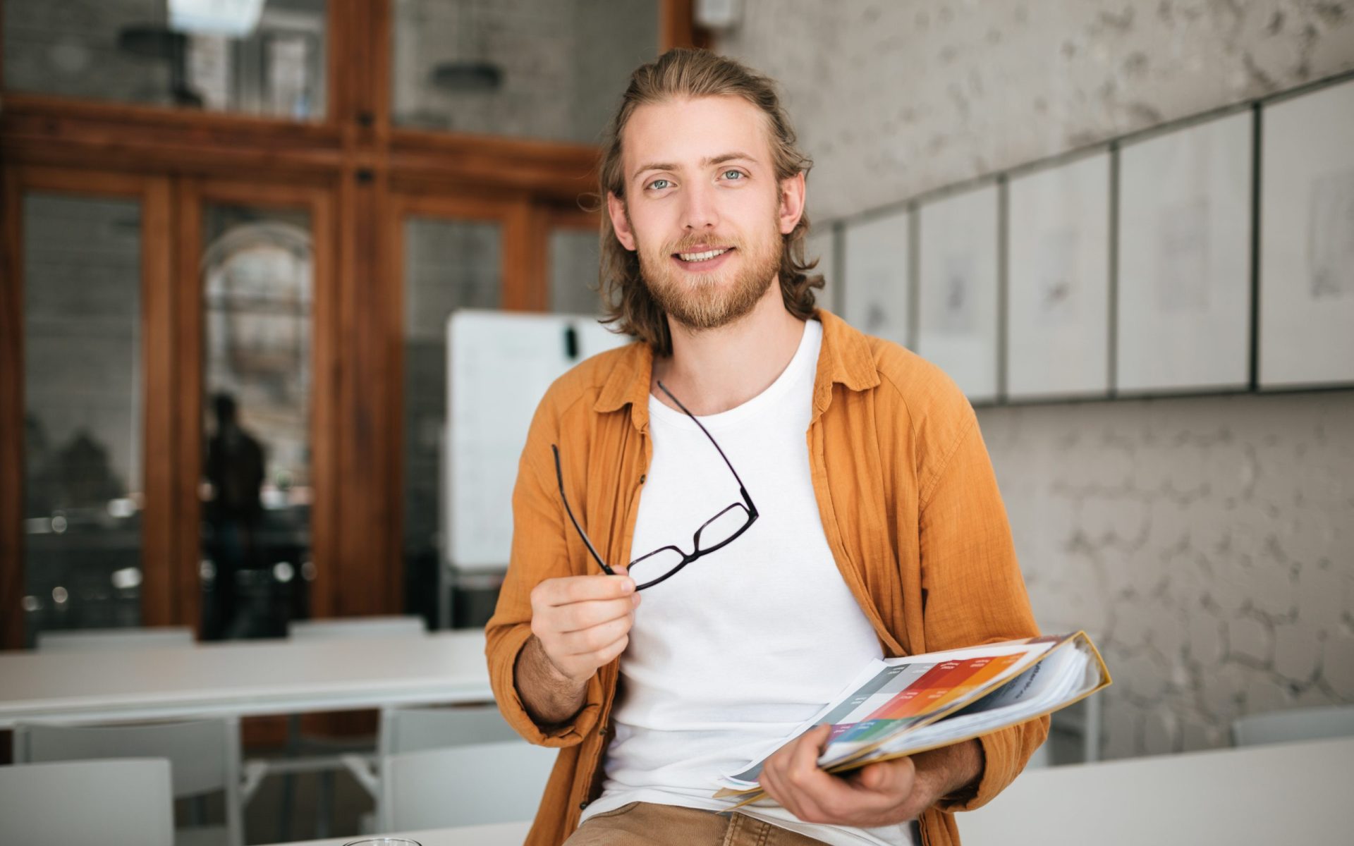 smiling-boy-with-blond-hair-and-beard-joyfully-loo-5USXMTR-scaled.jpg